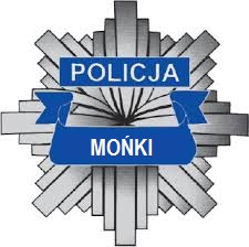 Zdjęcie w kolorze. Gwiazda policyjna z napisem POLICJA MOŃKI.