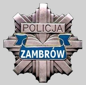 odznaka policyjna z napisem ZAMBRÓW