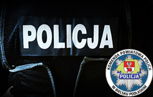 napis policja i w prawym rogu logo komendy powiatowej Policji w Bielsku Podlaskim