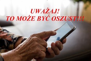 dłonie z telefonem i czerwony napis uważaj to może być oszust