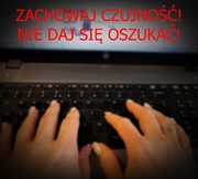 dłonie na klawiaturze i napis zachowaj czujność nie daj się oszukać