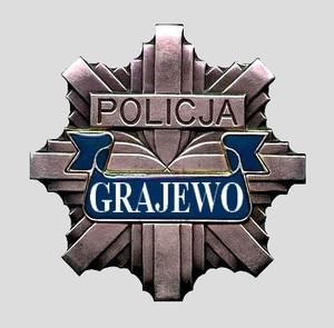 gwiazda policyjna z napisem Grajewo