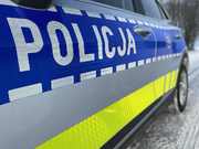 bok radiowozu z napisem policja